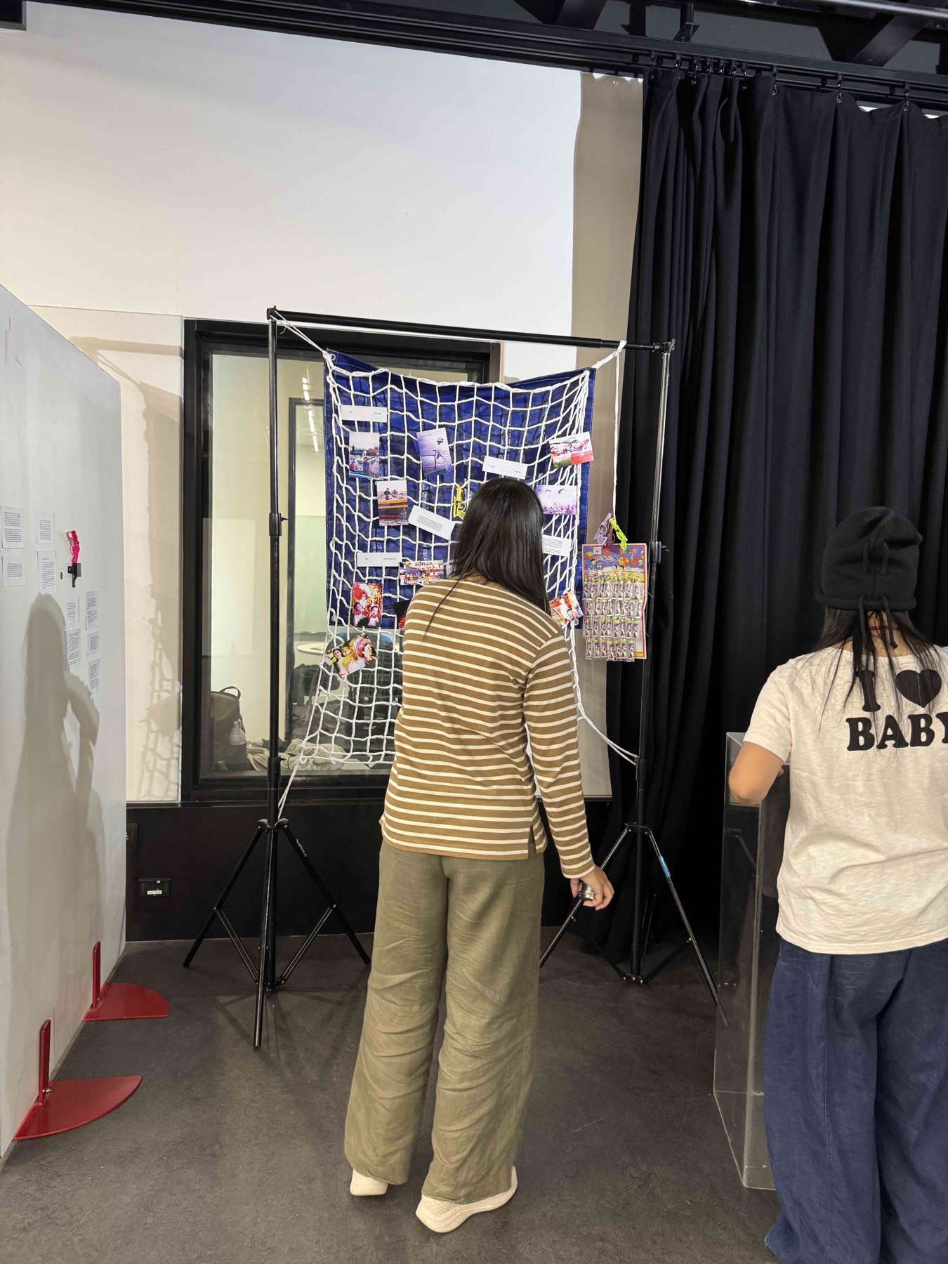 Net installation with visitors reaching in
